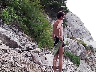 Twink Atop A Catch Rocks